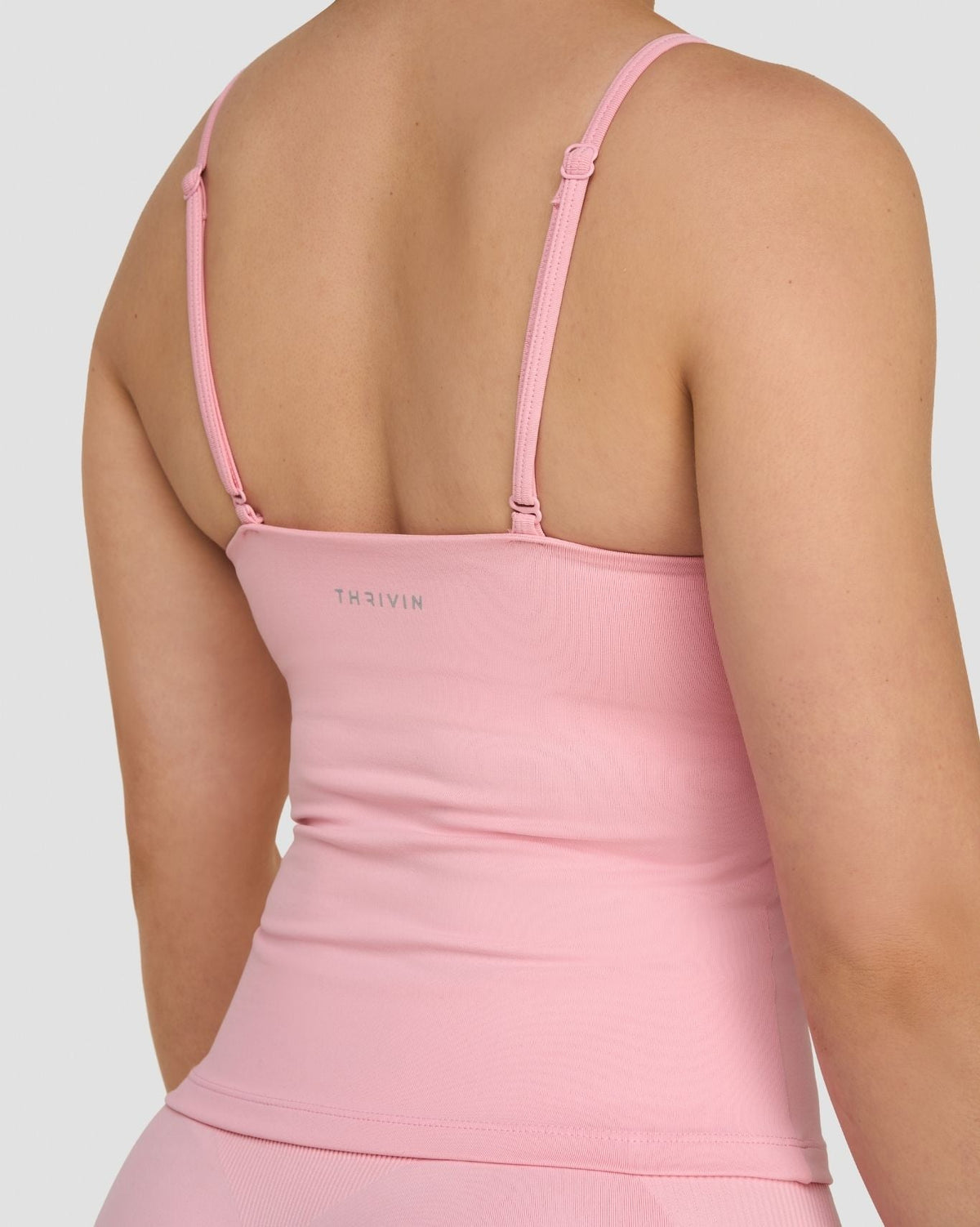 Elevate Sculpting Seamless Scoop Neck Cami in Cotton Pink, back close-up of adjustable straps and Thrivin logo