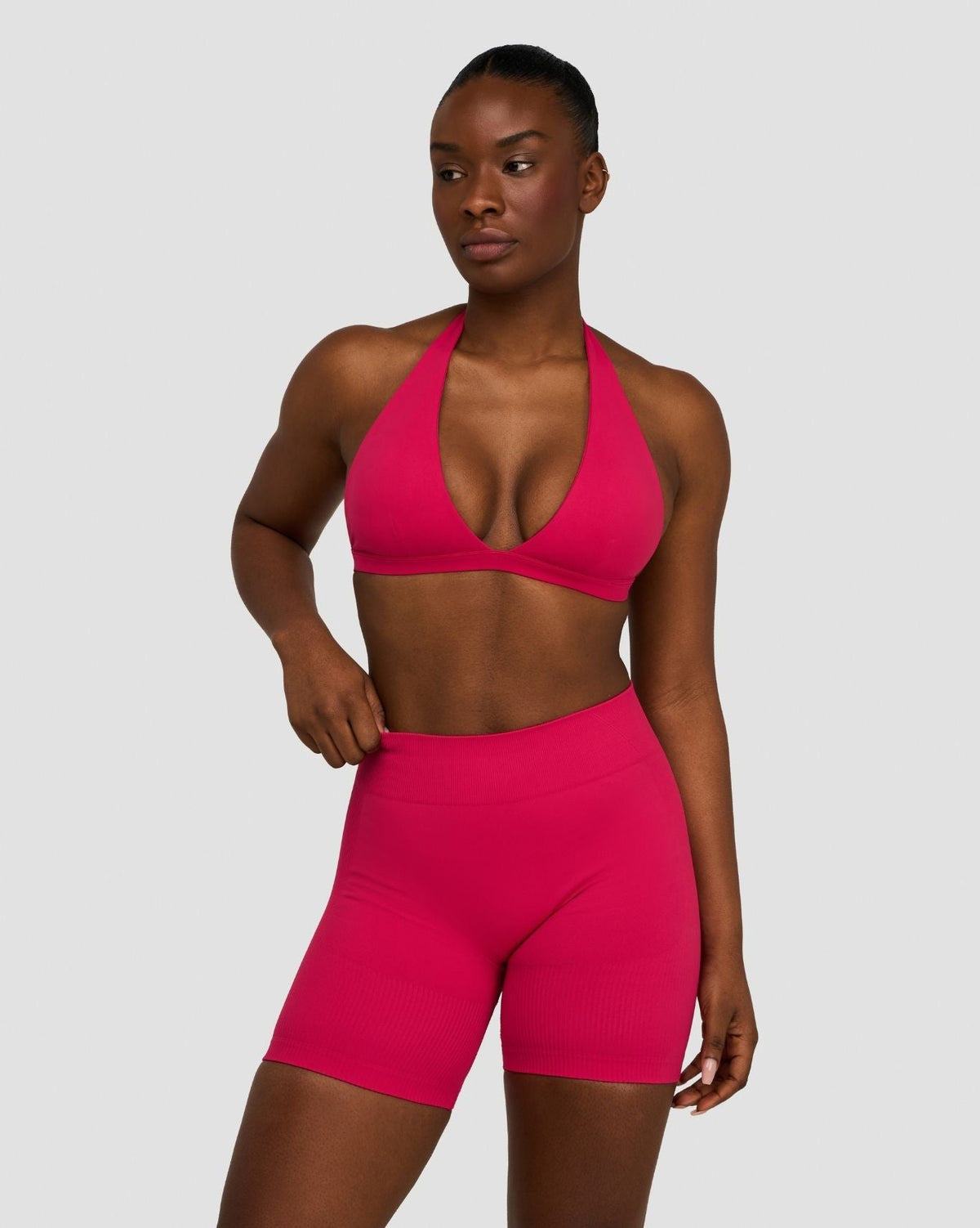 Elevate Sculpting Seamless V-Neck Halter Bra in Strawberry, front view styled with matching shorts