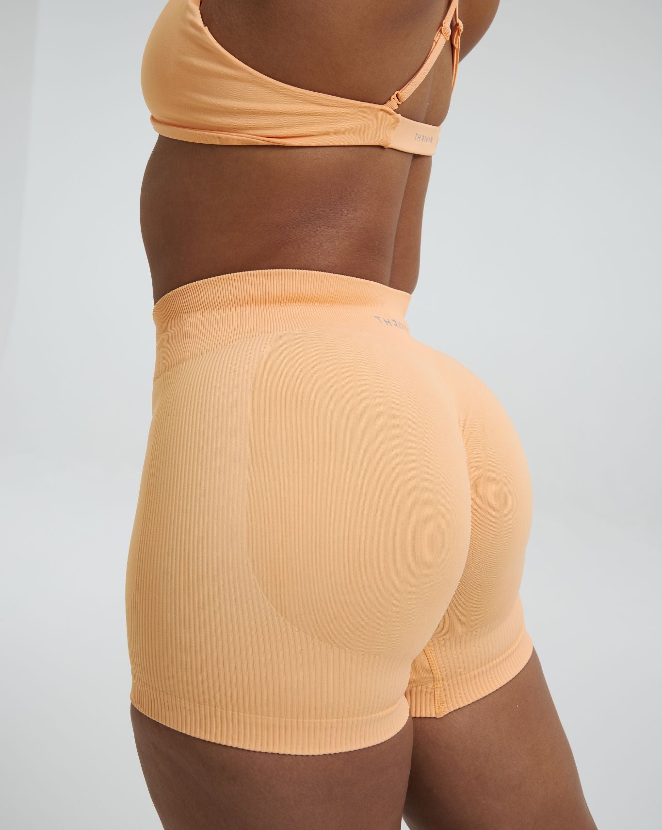 Elevate™ Sculpting Mid Waist Scrunch Shorter Shorts | Melon