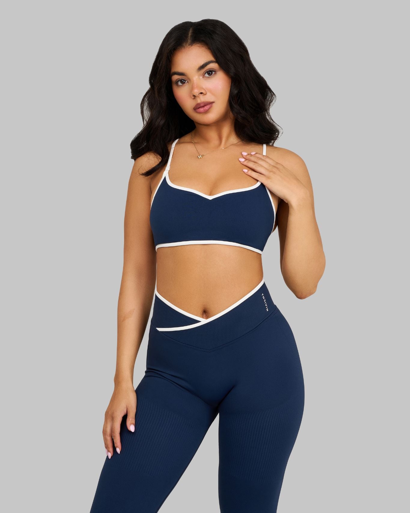 Alex is 5’5” and wears a size S.