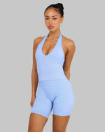 Lottie is 5’3” and wears a size XS.