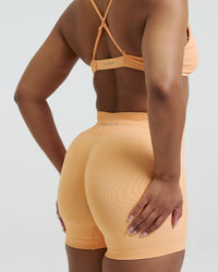 Elevate™ Sculpting Mid Waist Scrunch Shorter Shorts | Melon