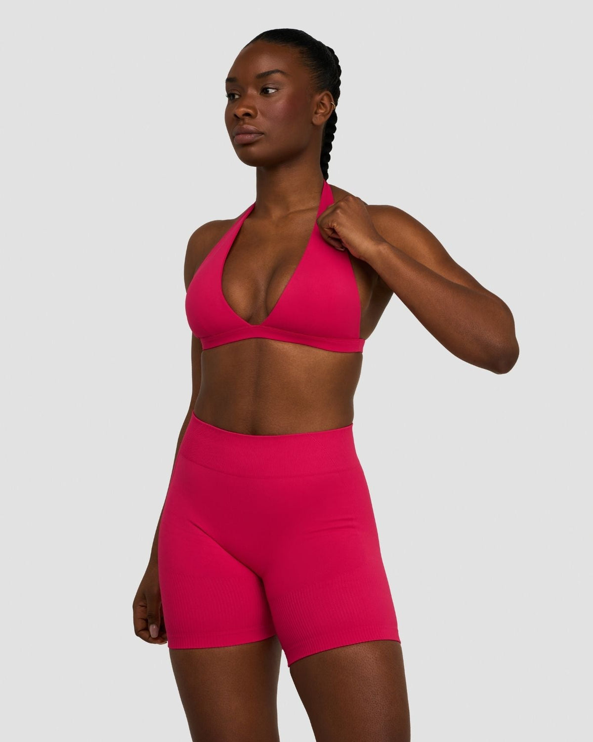 Elevate Sculpting Seamless V-Neck Halter Bra in Strawberry, three-quarter front view with halter straps and matching shorts